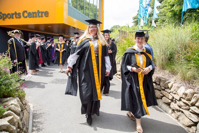 Grads leaving ceremony